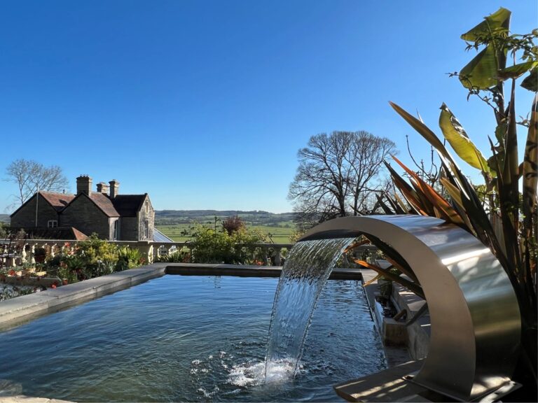 Pool with Fountain at Torside Health and Wellness Retreat